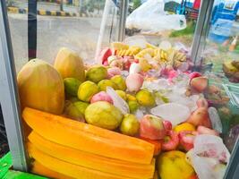 photography of fresh fruit in a box for street food sale photo