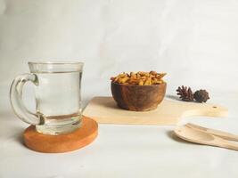 photography of cimi-cimi snacks with a glass of water photo