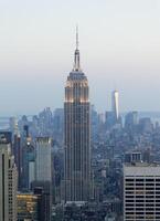 Empire State Building and Manhattan Cityscape at Dusk photo