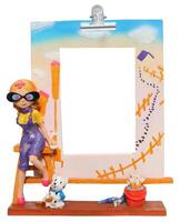 Frame with whitewash and little dog. photo
