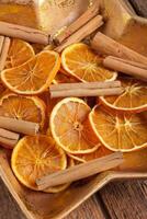 Centerpiece Christmas with orange slices and cinnamon photo