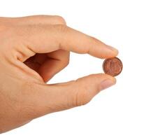 1 euro cent between the fingers photo