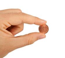 2 euro cent between the fingers photo