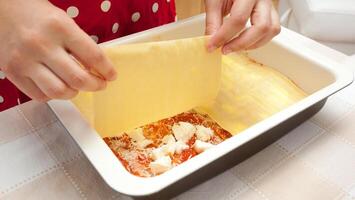 Preparation of homemade lasagna. photo