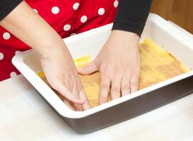 Preparation of homemade lasagna. photo