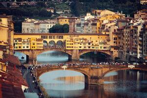 The Ponte Vecchio at sunset, in Florence. photo