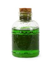 Bottle of green liquid photo