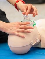 CPR training with dummy photo