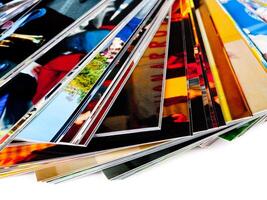 Stack of the photos, isolated on a white background photo