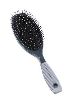 cepillo para el pelo aislado en blanco foto