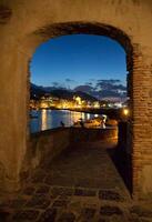 View from archway of bay of Ischia island, Italy photo