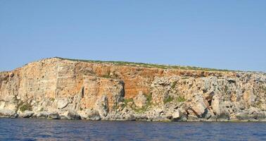 View of Coastline with generic rock, Gozo, Malta photo