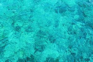 Crystal clear turquoise water in the Maldives. photo