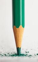 Broken tip of green pencil photo