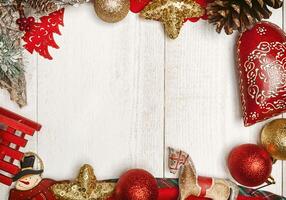 Christmas frame on white wood background. photo