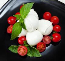 Mozzarella di Bufala, fresh cheese, italian dairy product. photo