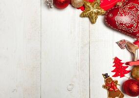 Christmas frame on white wood background. photo