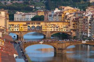 The Ponte Vecchio at sunset, in Florence. photo