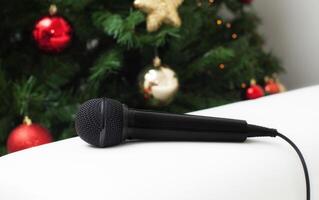 Black microphone with christmas tree photo