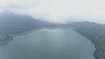lake in the rainforest panorama from a drone video