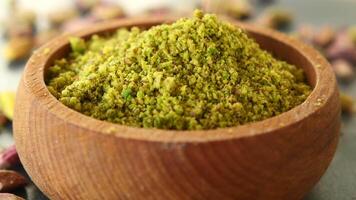 Wooden bowl filled with pistachios paste, a natural and nutritious superfood video