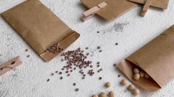 Paper bags with seeds for planting. video