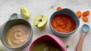 Healthy baby food in bowls. video