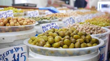 Buckets of olives for salea local food market video