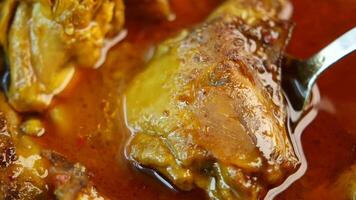 Chicken curry or masala in a bowl on table video