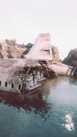 Derelict plane on craggy island beach video