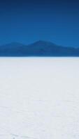 Bonneville Salt Flats landscape with rain storm clouds in distance video