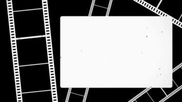 Roll film animation with paper inside on black color video