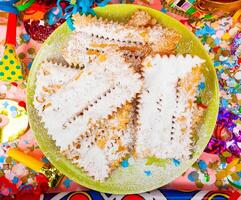 Chiacchiere or Cenci, typical Italian dessert for carnival. photo