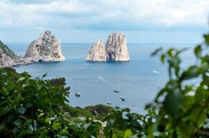 Faraglioni, famous giant rocks, Capri island photo