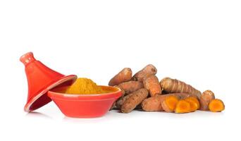 Turmeric roots and powder photo