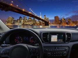 View of a car dashboard in new traveling to New York City photo