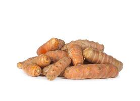 Turmeric roots on white. photo