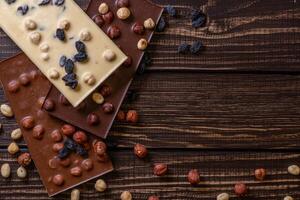 Chocolate bar pieces. Background with chocolate. Sweet food photo concept.