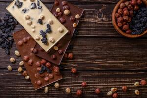 Chocolate bar pieces. Background with chocolate. Sweet food photo concept.