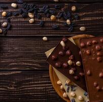 Chocolate bar pieces. Background with chocolate. Sweet food photo concept.