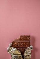 Chocolate bar pieces. Background with chocolate. Sweet food photo concept.