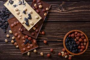 Chocolate bar pieces. Background with chocolate. Sweet food photo concept.