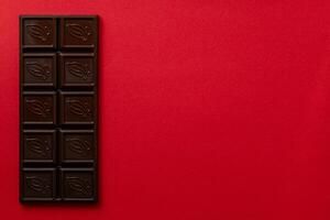 Chocolate bar pieces. Background with chocolate. Sweet food photo concept.