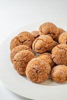 A group of Warm Homemade Gingersnap Cookies photo