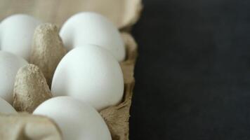 close up of eggs in a carton on table video