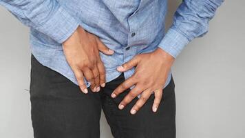 the concept of prostate and bladder problem, crotch pain of a young person video