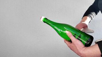 Person Holding Green Bottle video