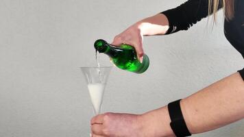 Pouring sparkling wine Into Glass video