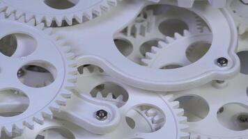 Harmonious Operation of White Cogs Wheel Gears Footage. video