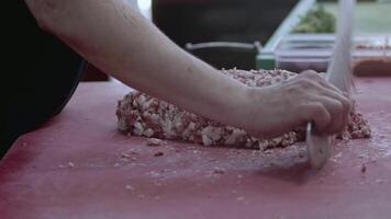 Adana Kebab Master Turns Lamb Meat into Minced Meat with an Armor Knife Footage. video